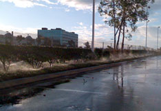 water sprinklers during a rain storm